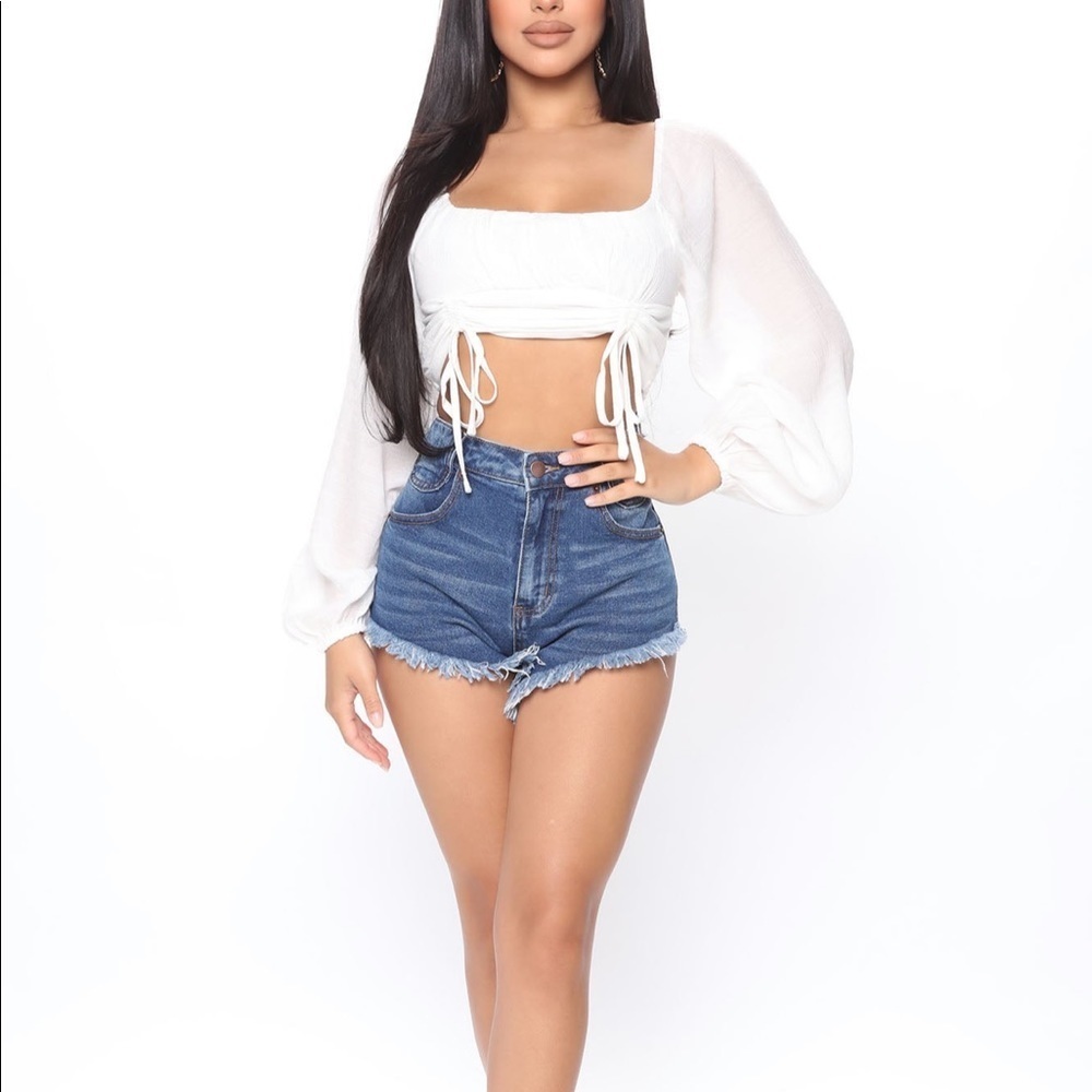 Fashion Nova denim shorts.